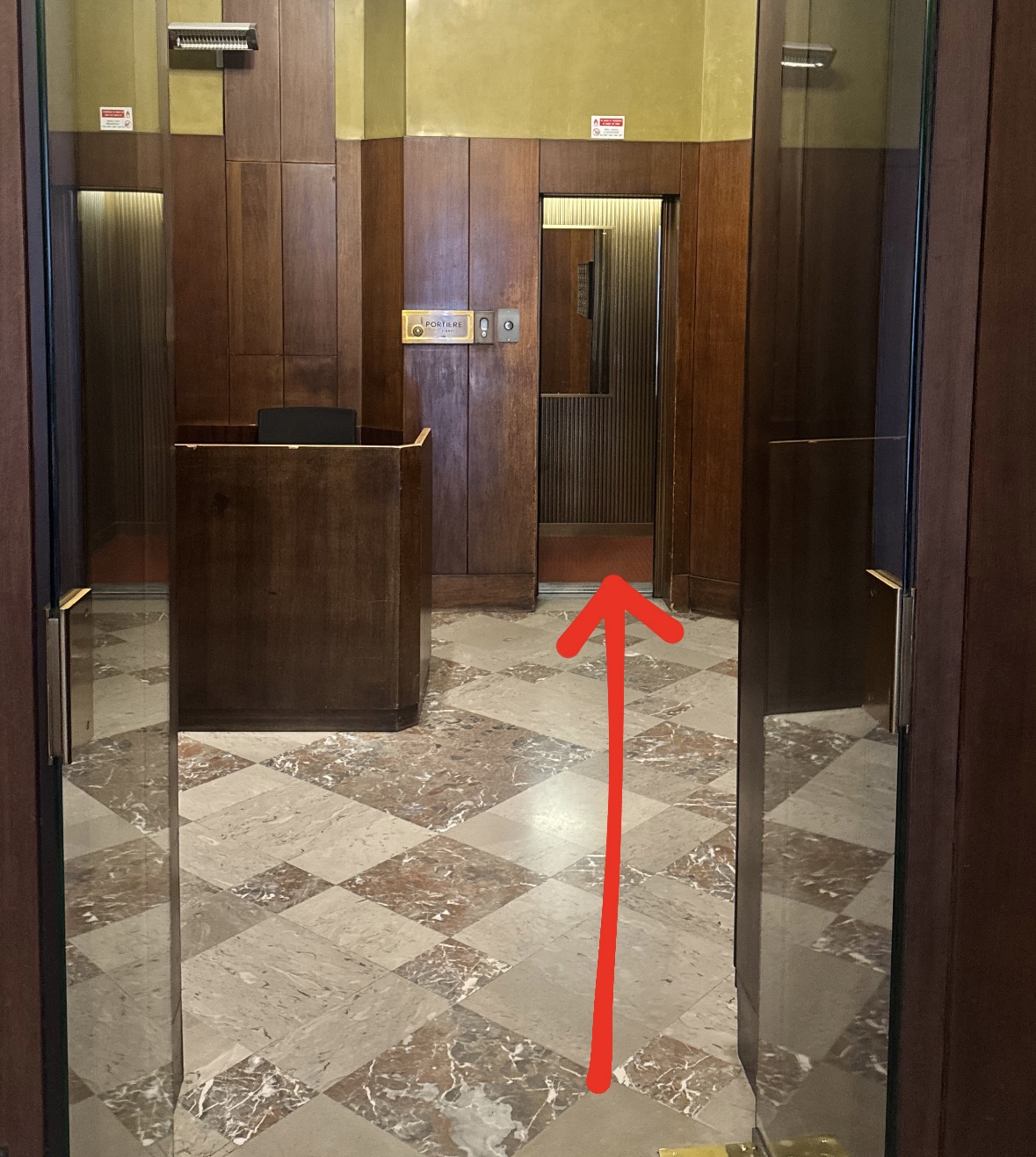 Entrance: elevator at the end of the corridor